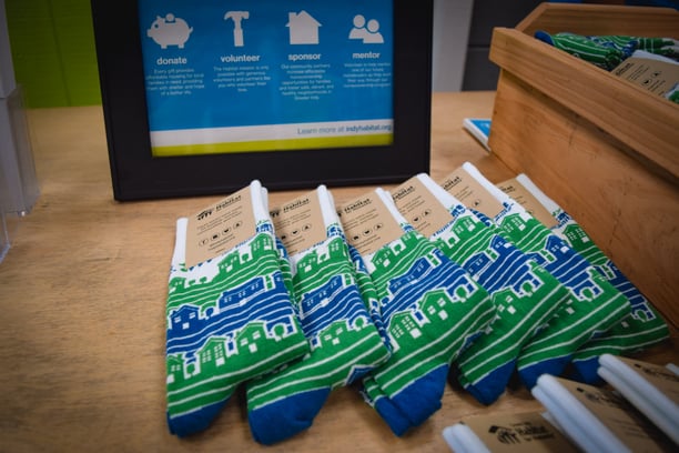 greater indy habitat for humanity grean and blue custom socks skyline